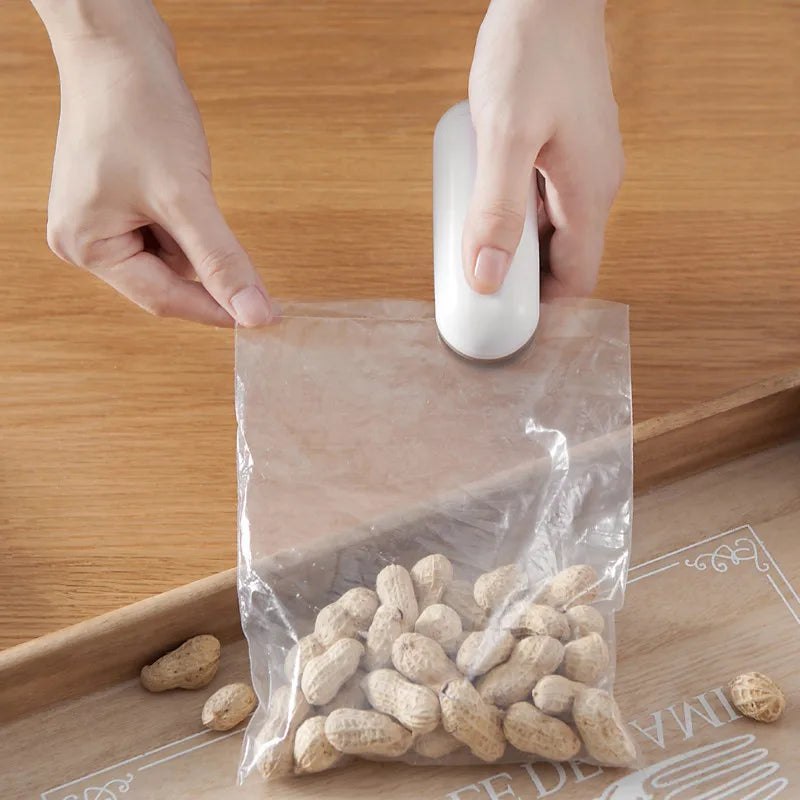 Mini Sealing Machine Portable Heat Sealer Plastic Package Storage Bag Handy Sticker and Seals for Food Snack Kitchen Accessories NEXVIA